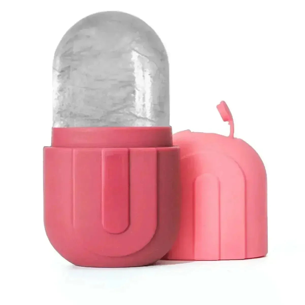Pink silicone ice roller for face with clear ice chamber and removable cap for skincare cooling and lifting therapy