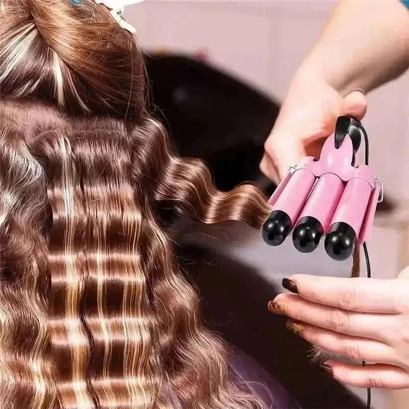 Triple Barrel Hair Waver ceramic curling iron creating soft, beachy waves on brown hair