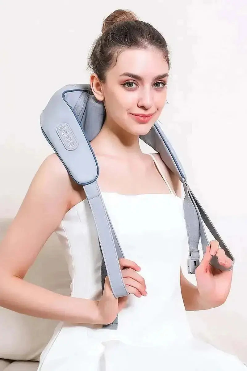 Woman using gray neck and shoulder massager with heat and air compression for relaxation and pain relief