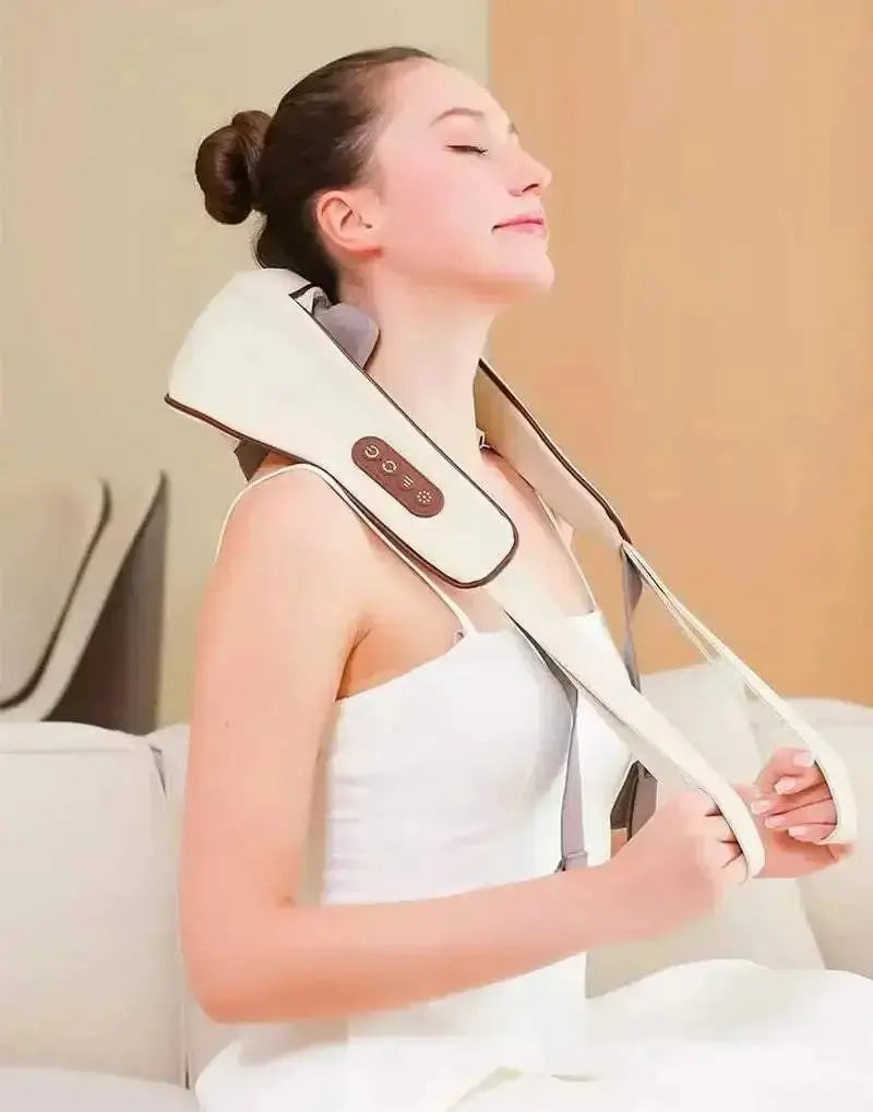 Woman using neck and shoulder massager with heat and shiatsu kneading for relaxation